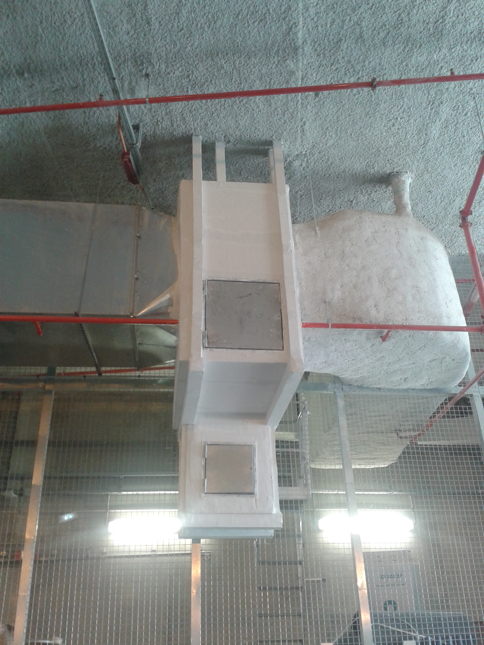 Trappe de visite coupe-feu EXTHA installée sur gaine staff